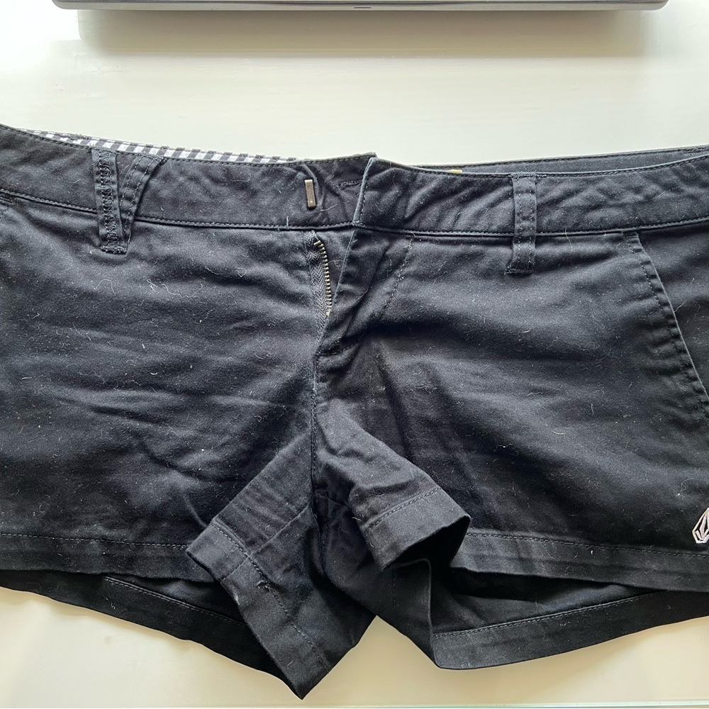 Black volcom shorts size 3- 2 pairs left I’ll do 1 for 12 or 2 for 20